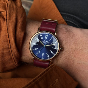 No.88 Rose Gold and Navy on Oxblood Leather